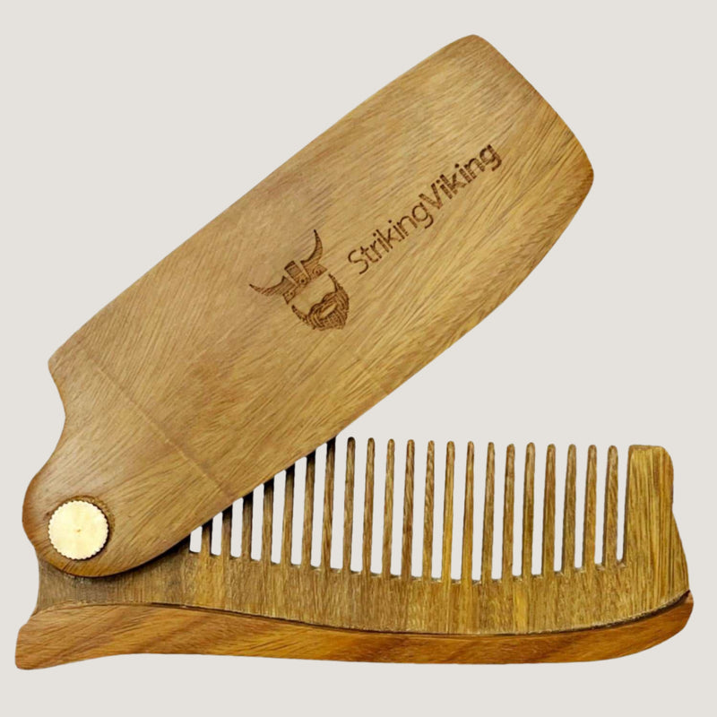 Folding wood comb for men made from sandalwood with anti-static properties.